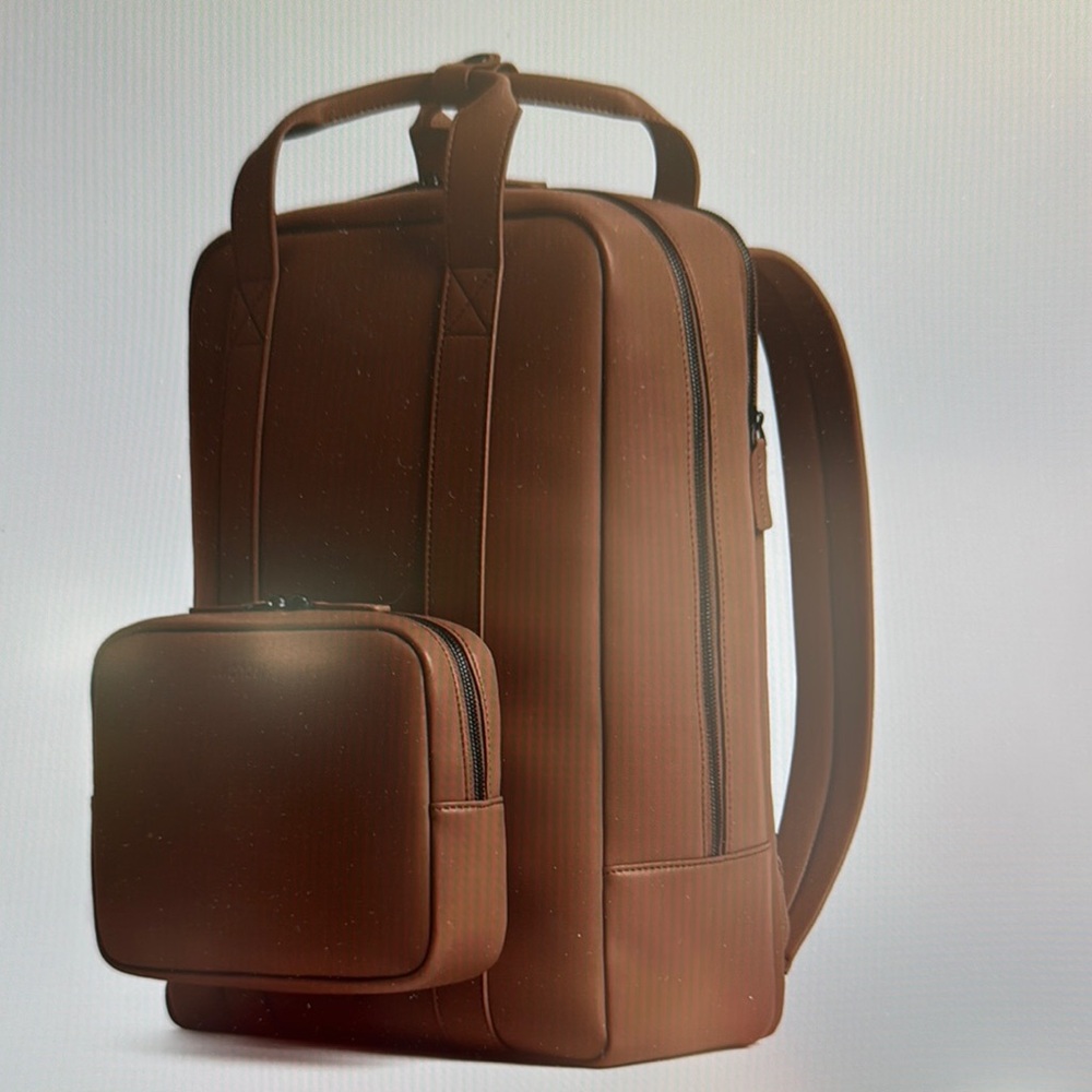 Monos backpack.  Used once.  Perfect condition.
